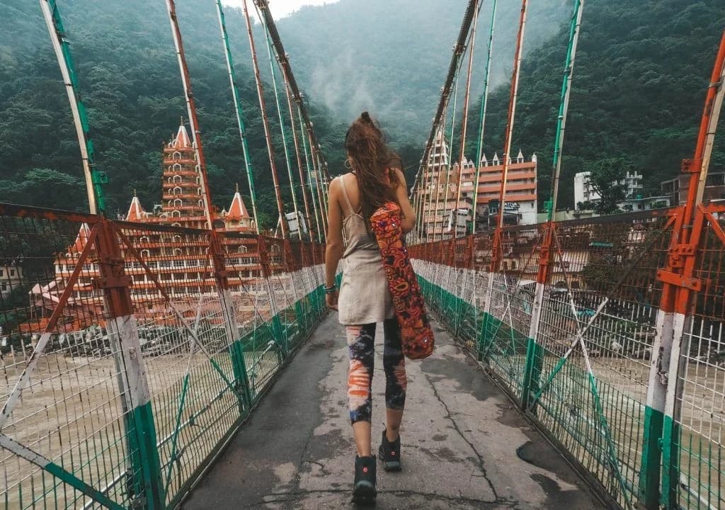 Walking across suspension bridge in Rishikesh